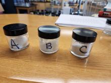 3 jars of unknown white powder labeled A, B & C