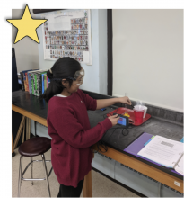 student working at lab counter